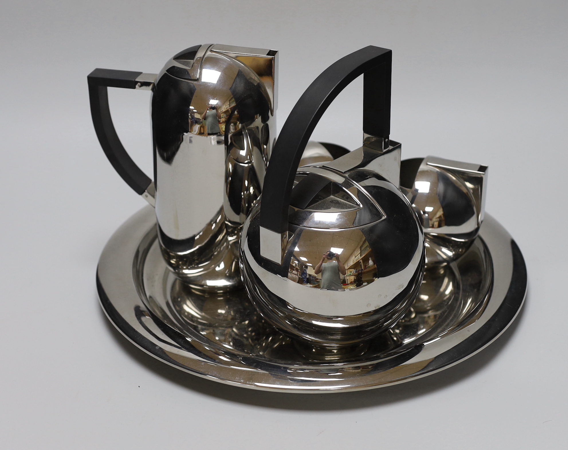 An Oliver Hemming Nio stainless steel tea set